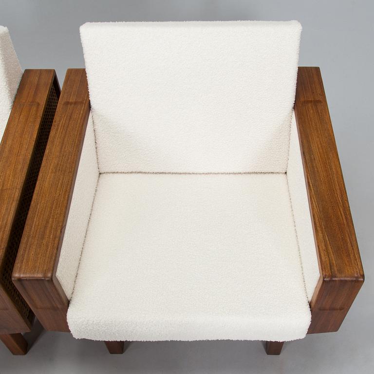 A pair of 1960s armchairs.