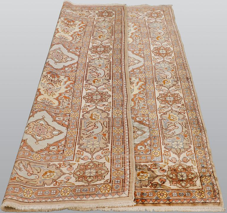 A semi-antique figural Kaysari silk carpet, approx. 100 x 70 cm.