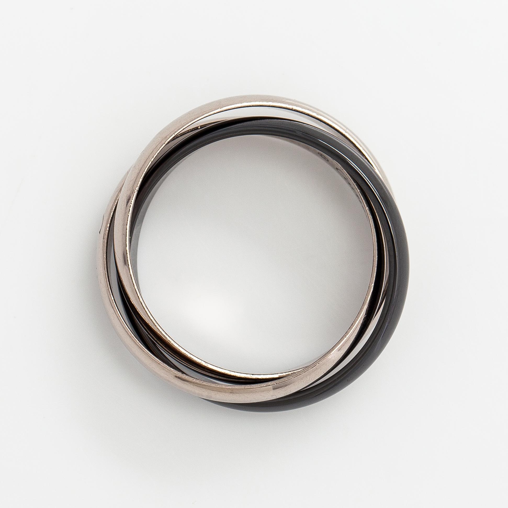 Cartier, An 18K white gold a ceramic ring "Trinity". Marked Cartier, JQV623.