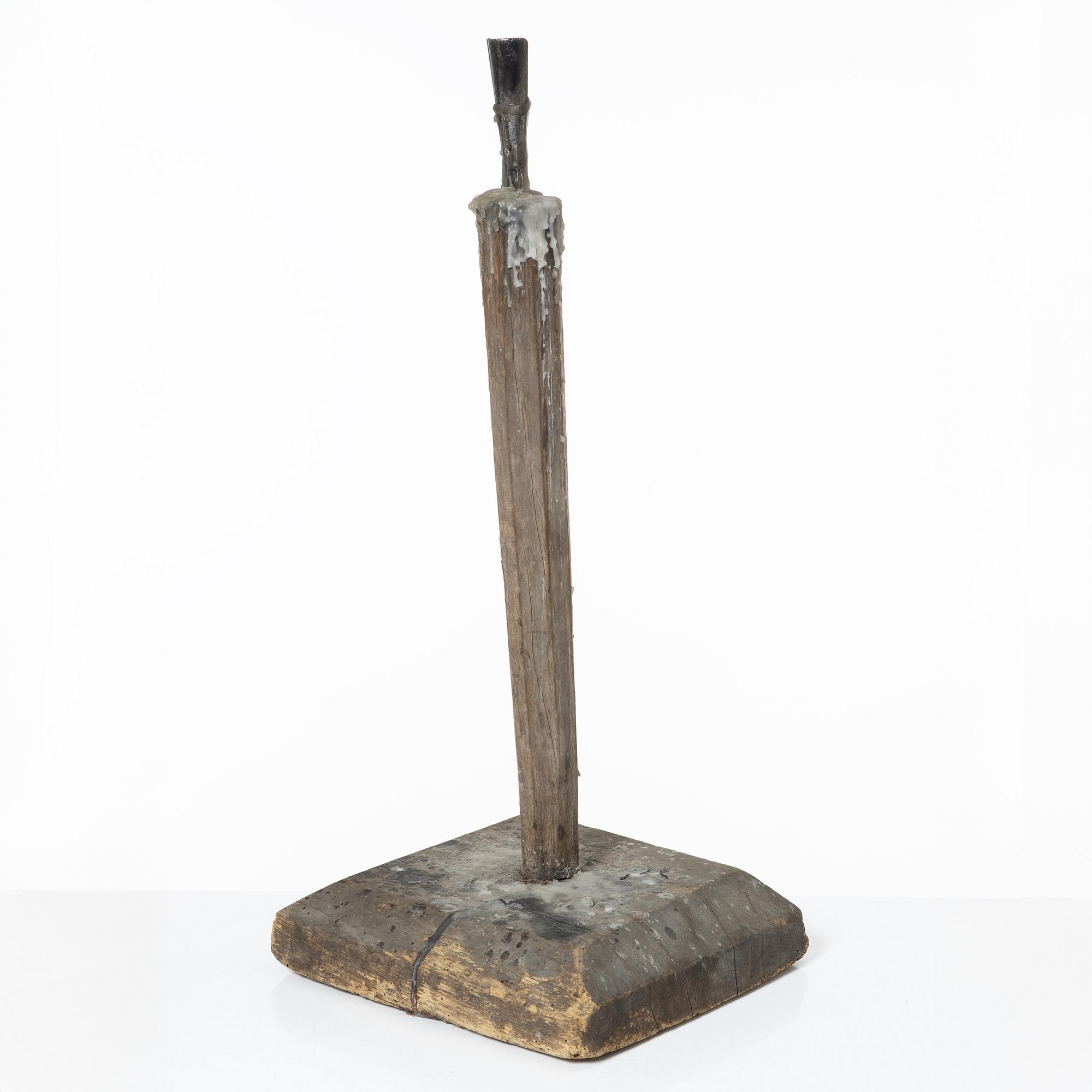 A candle stick, 19th/20th Century.