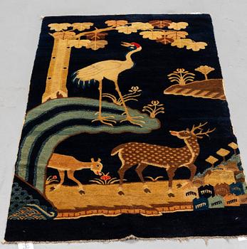 A RUG, semi-antique Baotou, China, ca 165 x 87 cm.