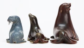 Three Gunnar Nylund stoneware figures, two seals and a walrus, Rörstrand.