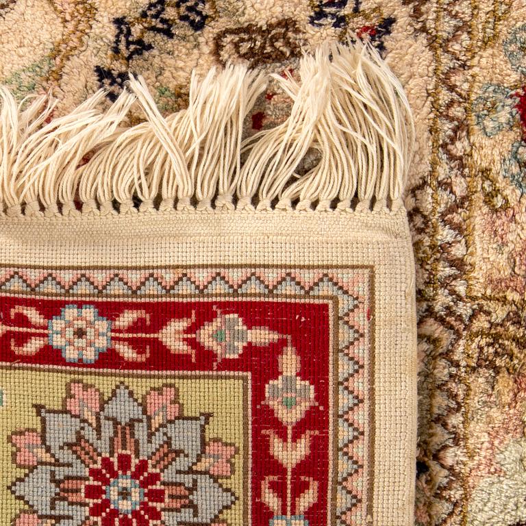 An old silk on cotton Kayseri carpet ca 177 x 123 cm.