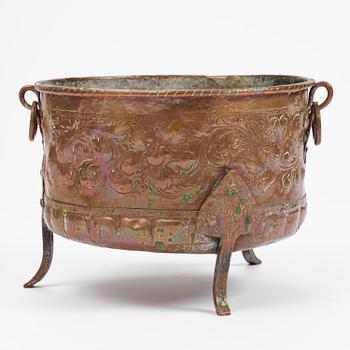 A Swedish baroque repousse copper cauldron, early 18th century.