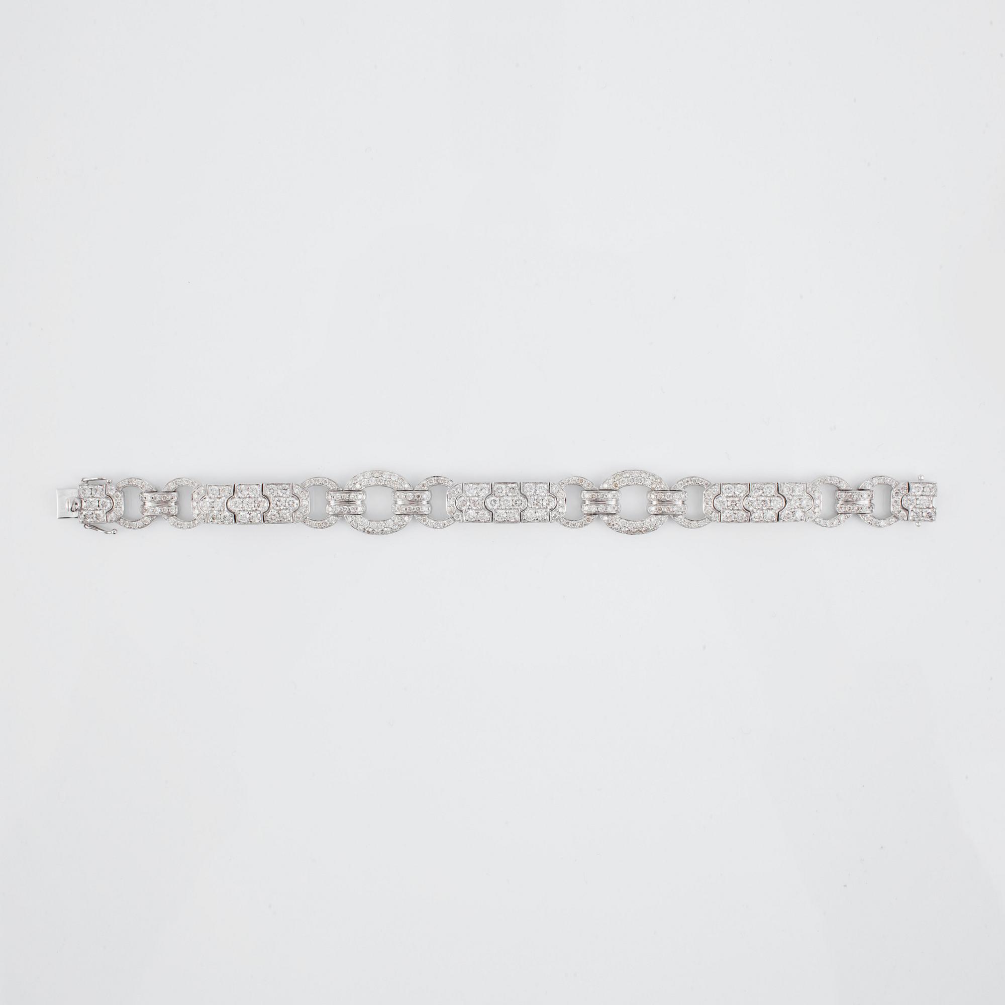 A brilliant-cut diamond bracelet. Total carat weight 7.85 cts.