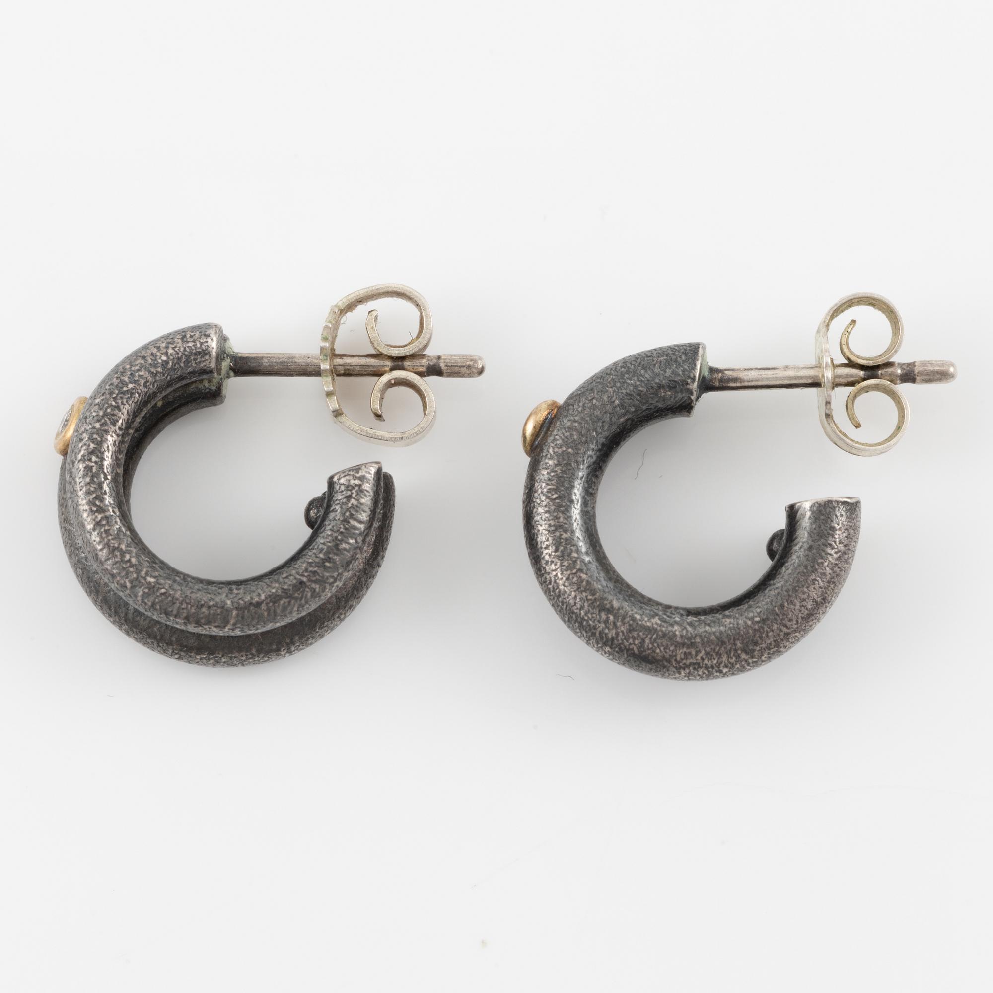 Bracelet, necklace, a pair of earrings, and a ring, Pia Rauff, silver with small diamonds.