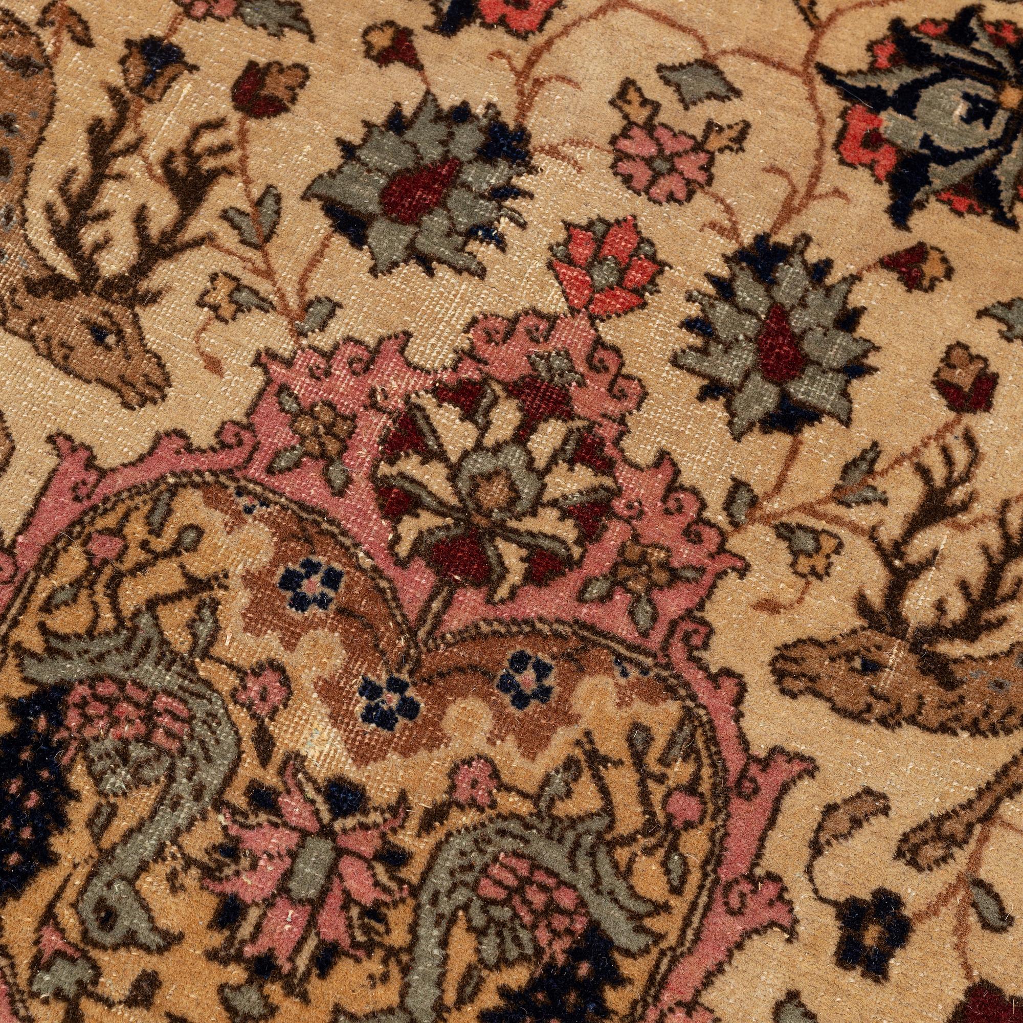 An antique Benlian Tabriz carpet, signed Jabarzade, ca 466 x 323 cm.