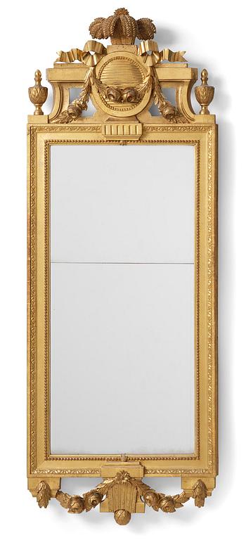 A Gustavian giltwood mirror by C. G. Fyrwald (master in Stockholm 1776-1825).