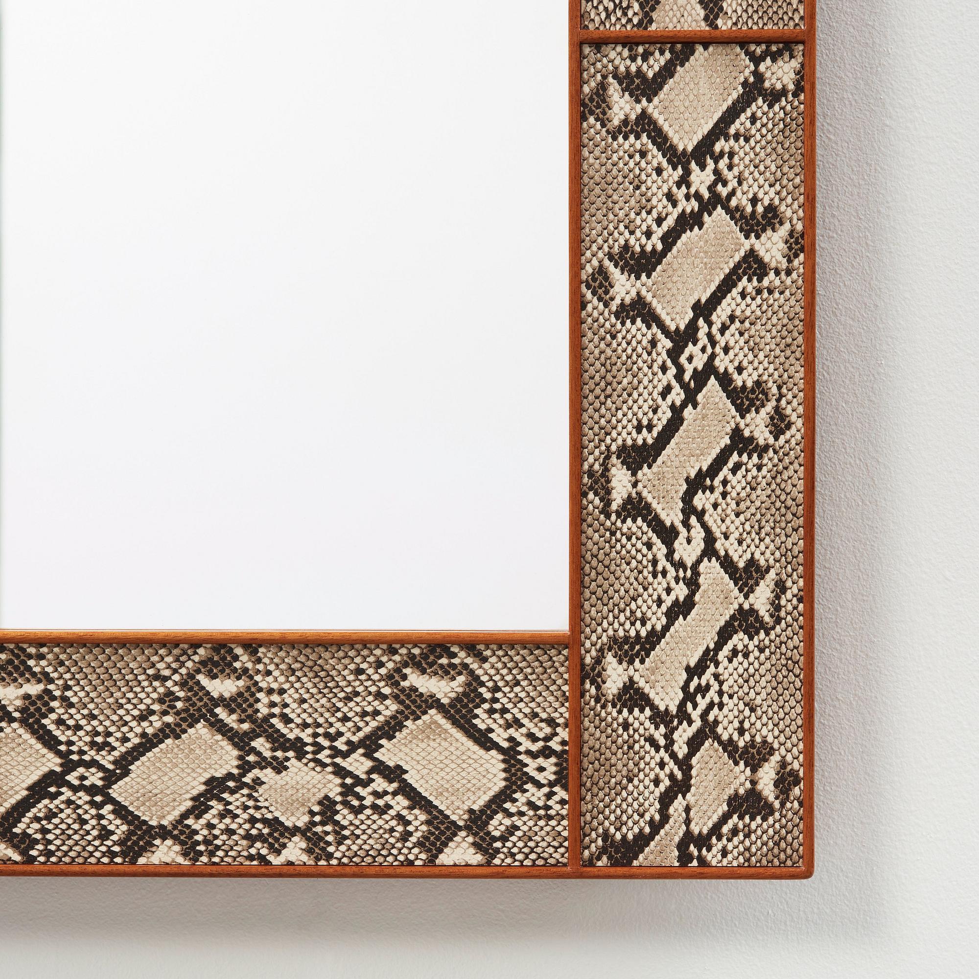 Josef Frank, A Josef Frank faux snakeskin mahoganyframed wall mirror, Svensk Tenn, Sweden 1950-60's.