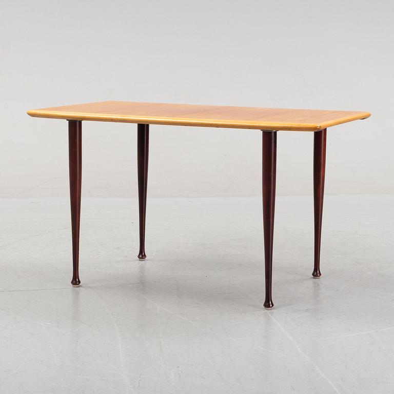 A teak veneered coffee table, 1950's/1960's.