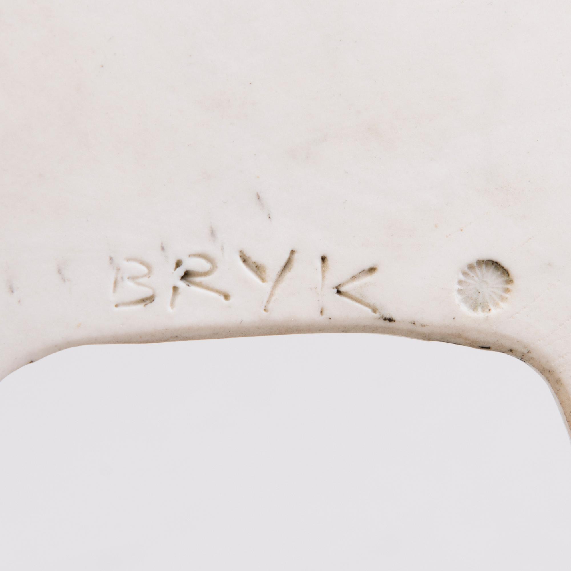 RUT BRYK, A stoneware relief signed BRYK.