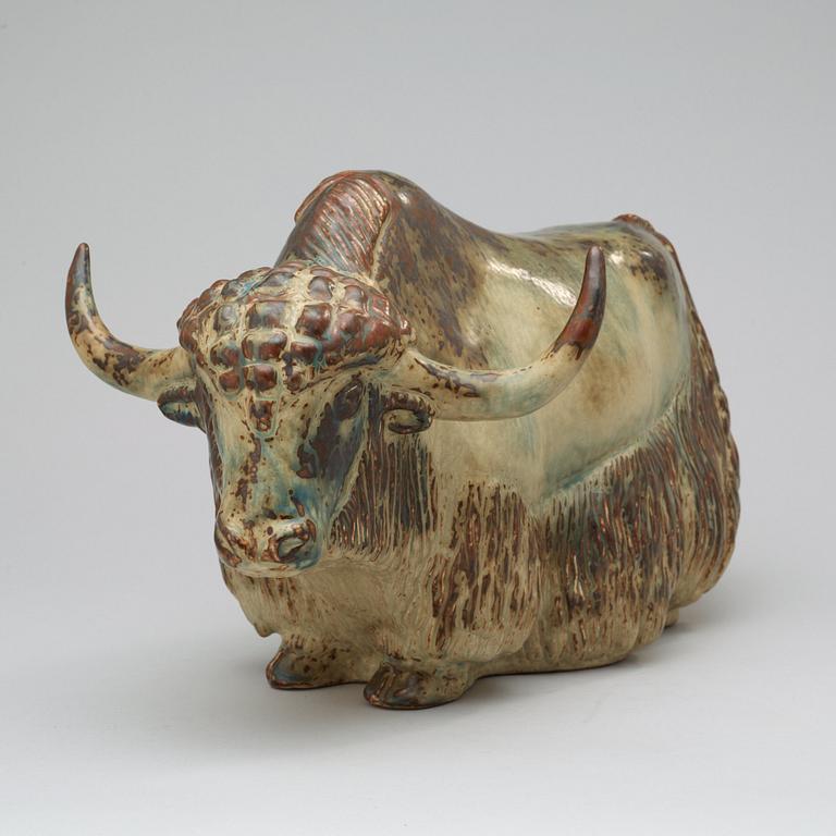 A Kaj Lange stoneware sculpture of a bison, Royal Copenhagen, Denmark 1966.