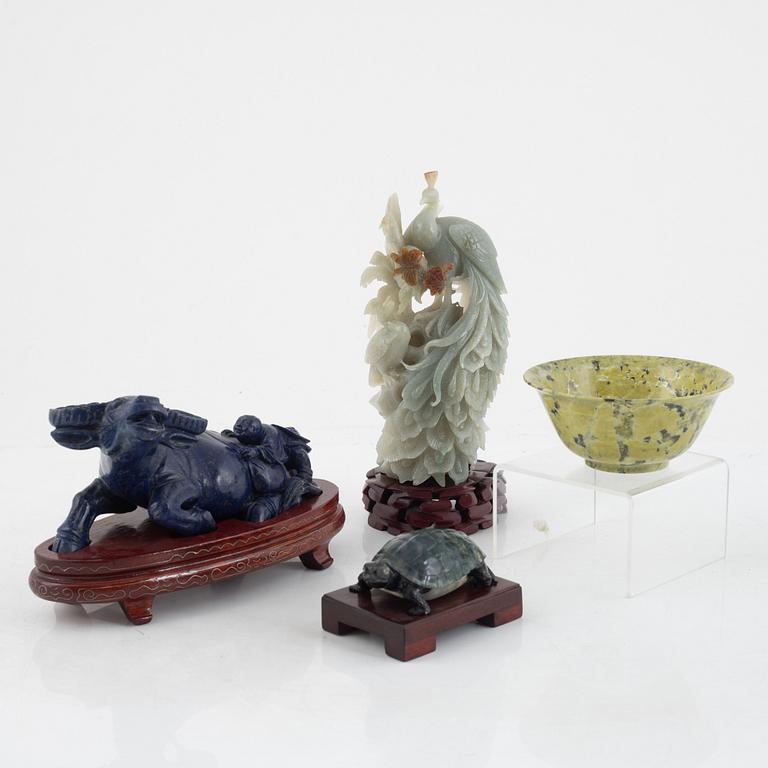 Three carved figurines and a bowl, China, 20th century.