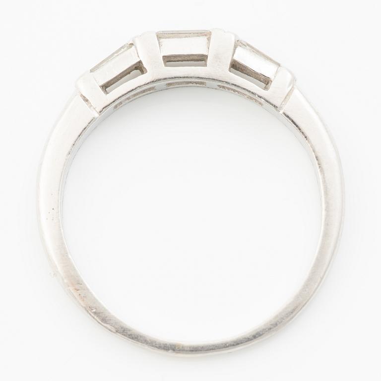 Platinum ring with baguette-cut diamonds.