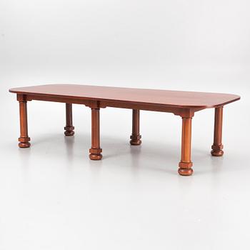 A mahogany and oak dining table, second half of the 20th century.