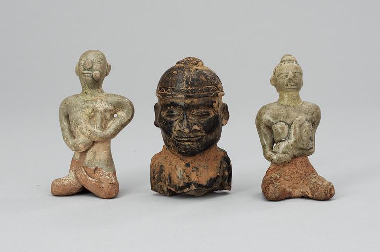 A set of three pottery figures, South America and Thailand.