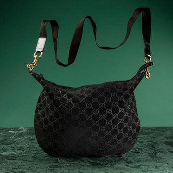 A bag by GUCCI.