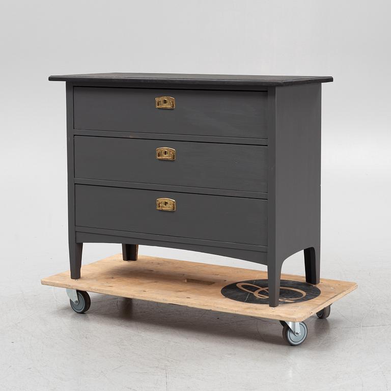 A painted chest of drawers, circa 1900.