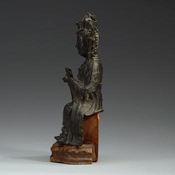 A seated bronze figure of Xi Wangmu, Ming dynasty, 17th Century.