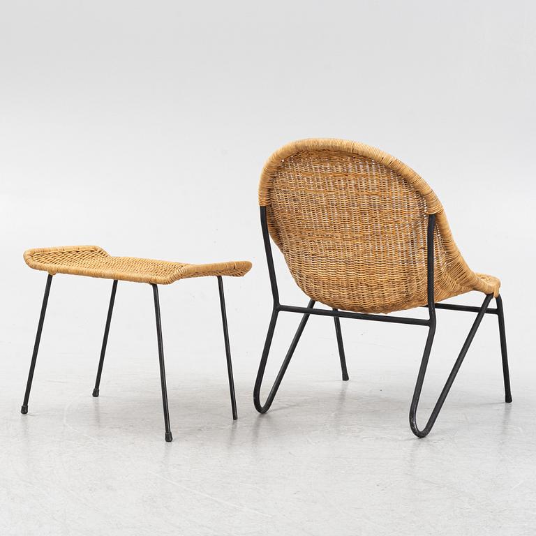 A rattan chair with ottoman, 1950's.