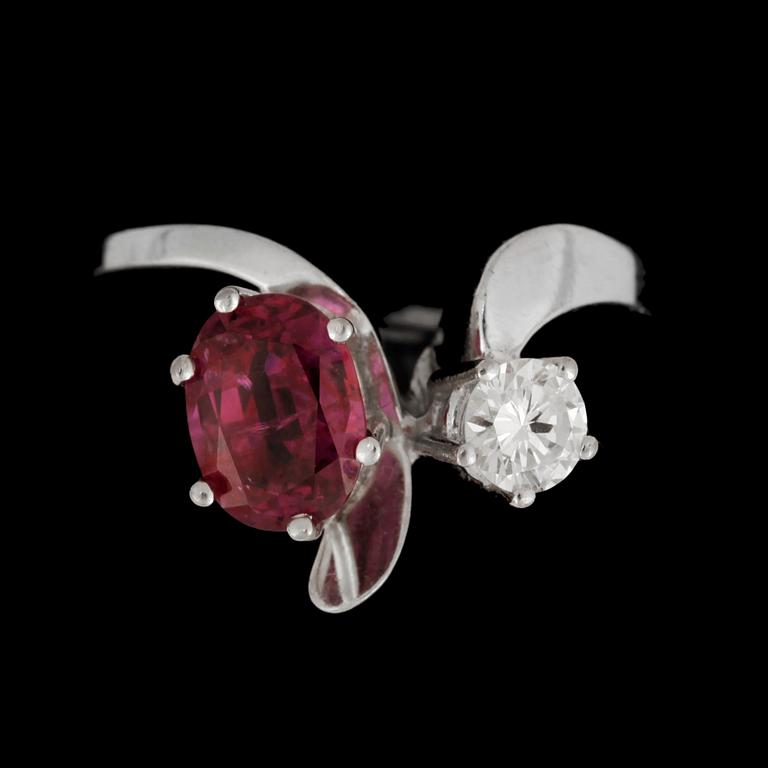A ruby, circa 2.00 cts and diamond, circa 0.37 ct, ring. Carat weight according to engraving.