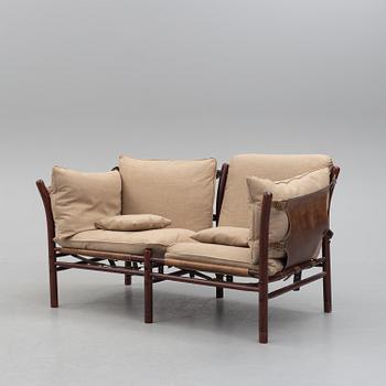 ARNE NORELL, an 'Ilona' stained wood and leather sofa fron Norell Möbel, Aneby, 1960's/70's.