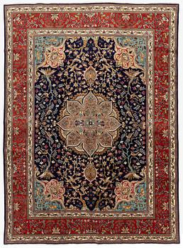 A carpet, Tabriz, signed Ipchilar, ca 385 x 280 cm.