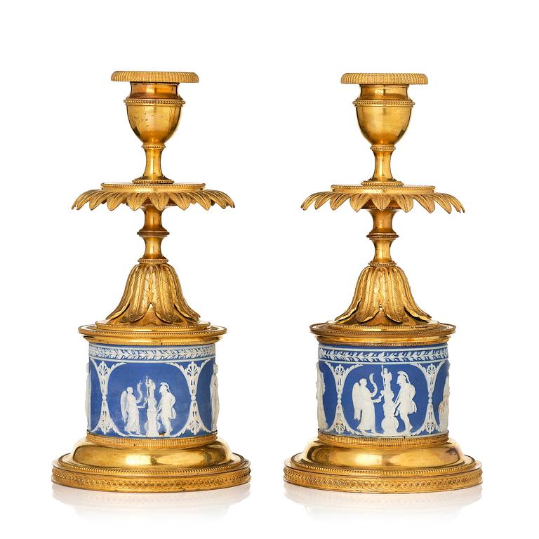 A pair of George III ormolu and jasperware candlesticks, late 18th century.