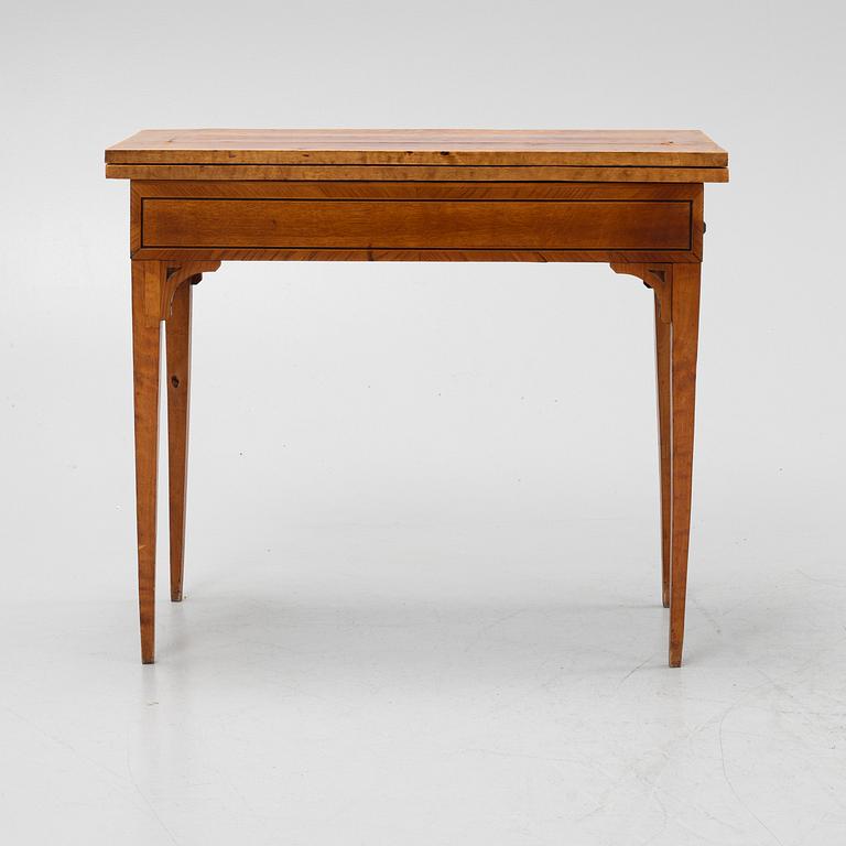 A birch card table, 19th Century.