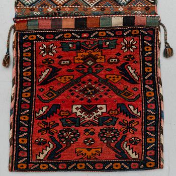 A semi-antique west persian saddlebag, circa 127 x 54,5 cm.