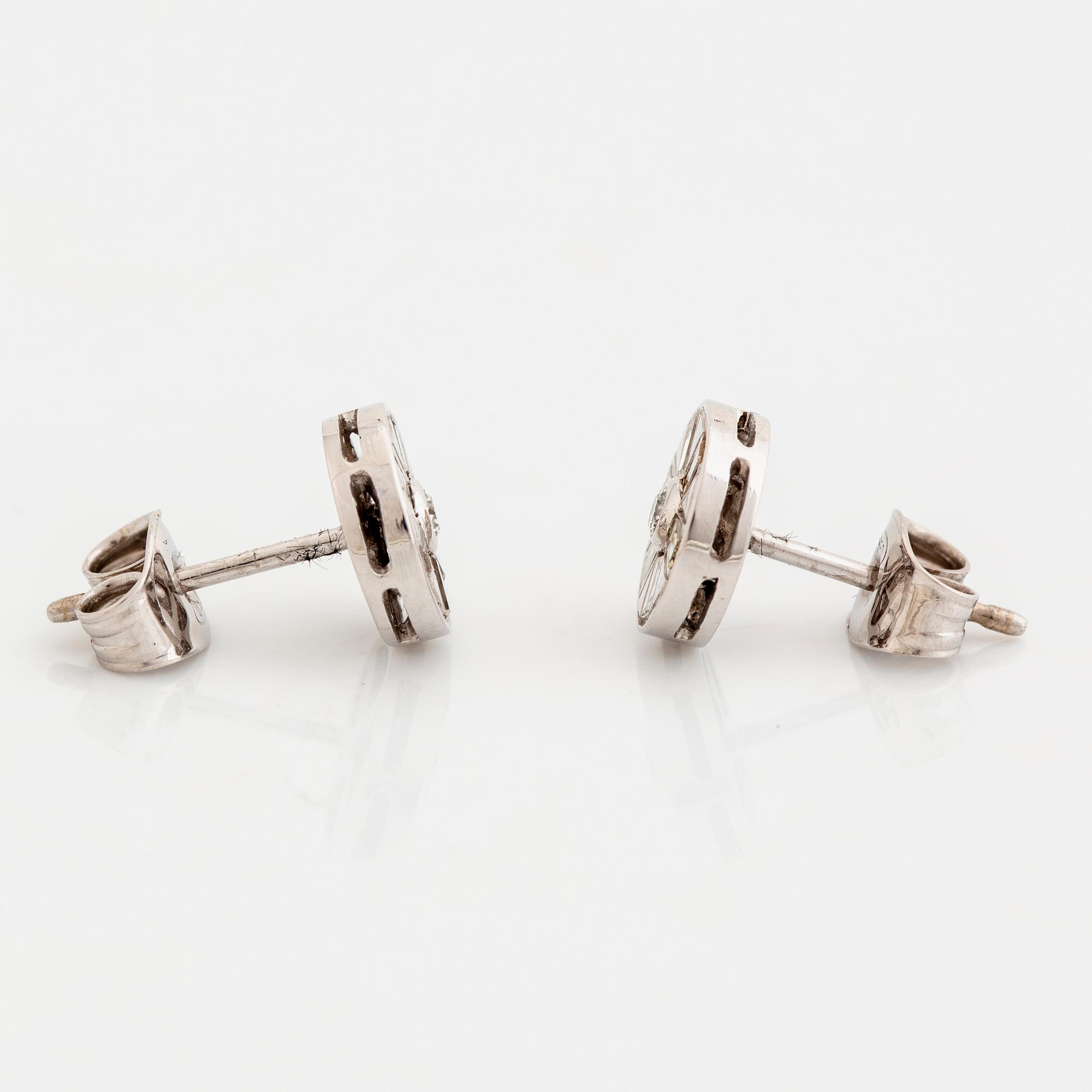 18K white gold, baguette and brilliant cut diamond earrings.