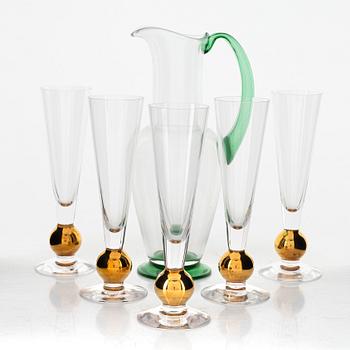 Gunnar Cyrén, 16 champagne "Nobel" glasses and a decanter, Orrefors, Sweden.