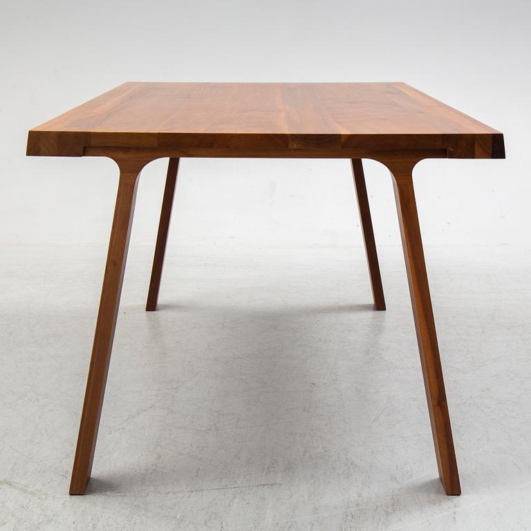 GIJS PAPAVOINE, A walnut 'Doble' dining table from Montis, The Netherlands, 2014.