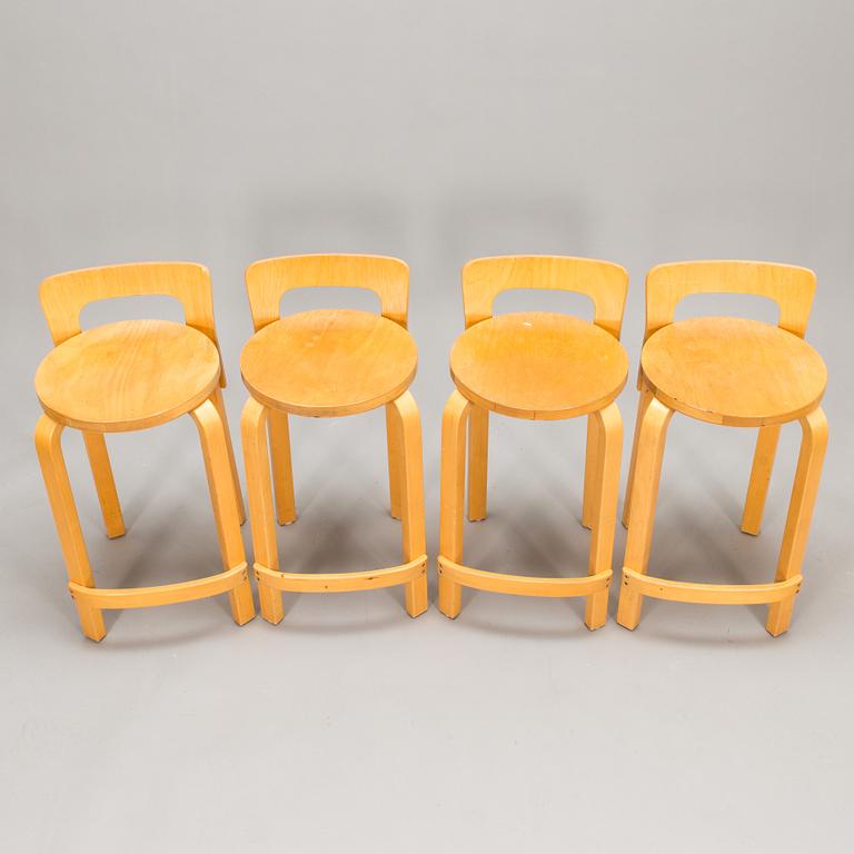 Alvar Aalto, A set of four K65 bar stools, Artek, Finland, late 20th century.