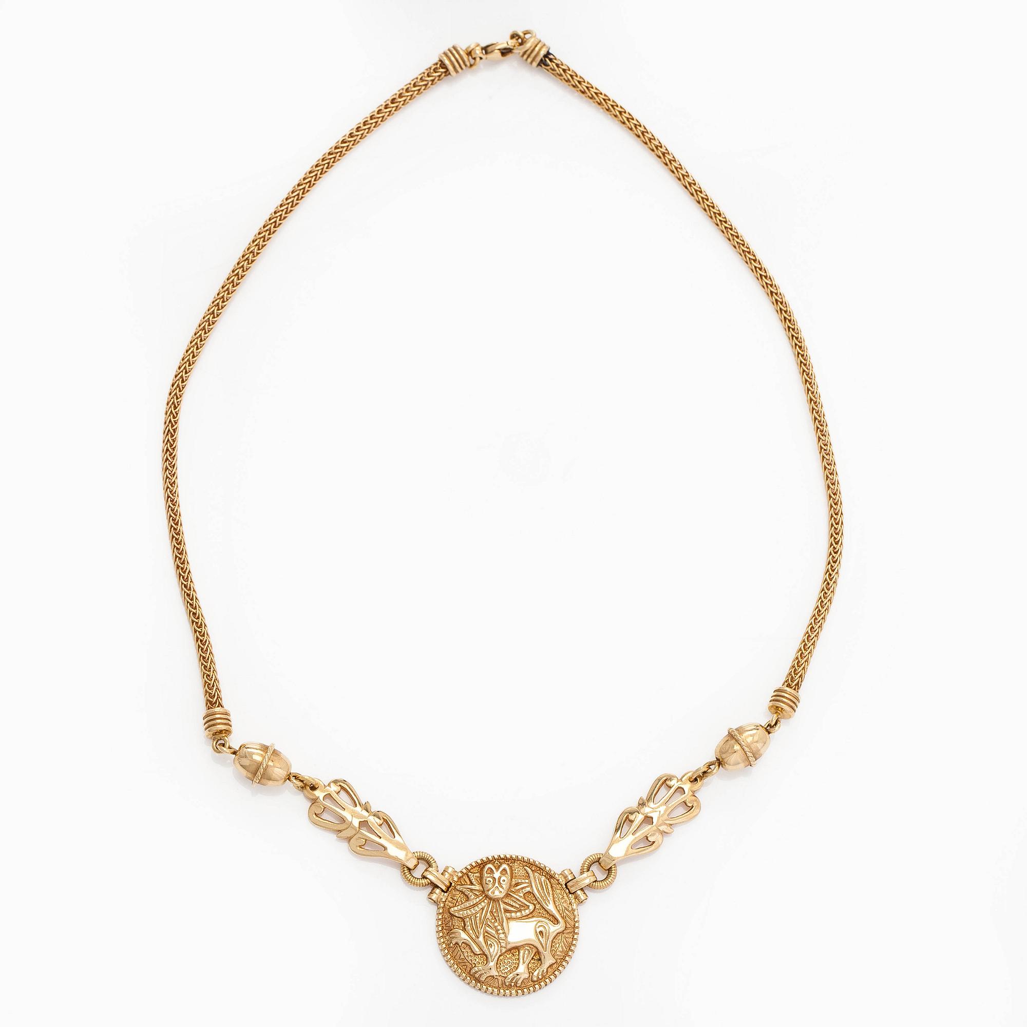 Kalevala Koru, an 18K gold 'Sun Lion* necklace, Helsinki 1997, numbered 137/180.
