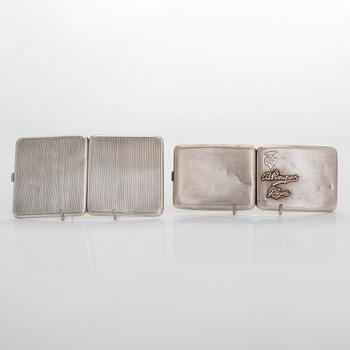 Two silver cigarette cases, J. H. Werner, Berlin, 1922, and Huguenin Frères, Switzerland before 1933.