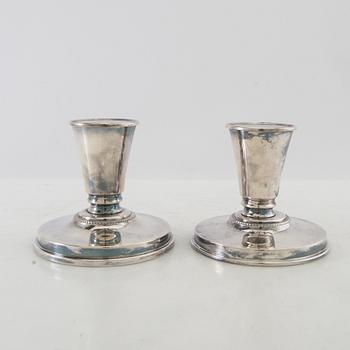 Candelsticks, a pair of silver-plated metal, first half of the 20th century.