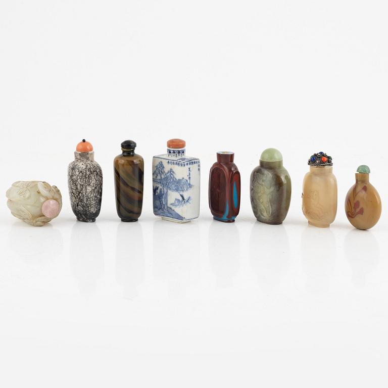 A group of 8 Chinese snuff bottles, 20th Century.