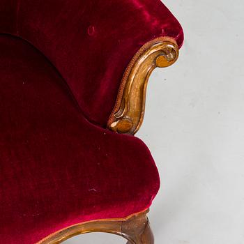 A Rococo Revival style armchair, late 19th century.