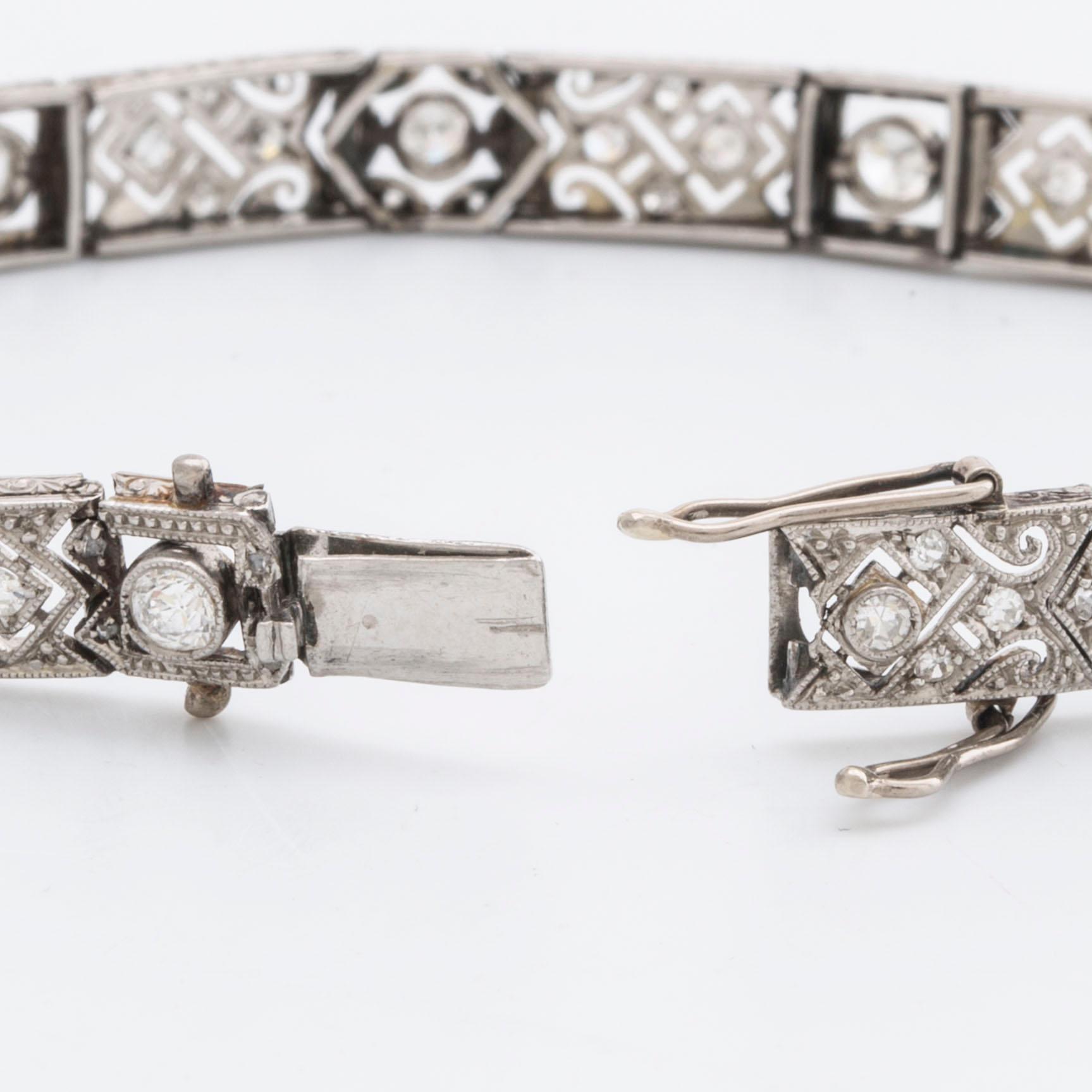 DIAMOND BRACELET, probably platinum, old and rose-cut diamonds approx 2 ct in total, 1 large stone not diamond.