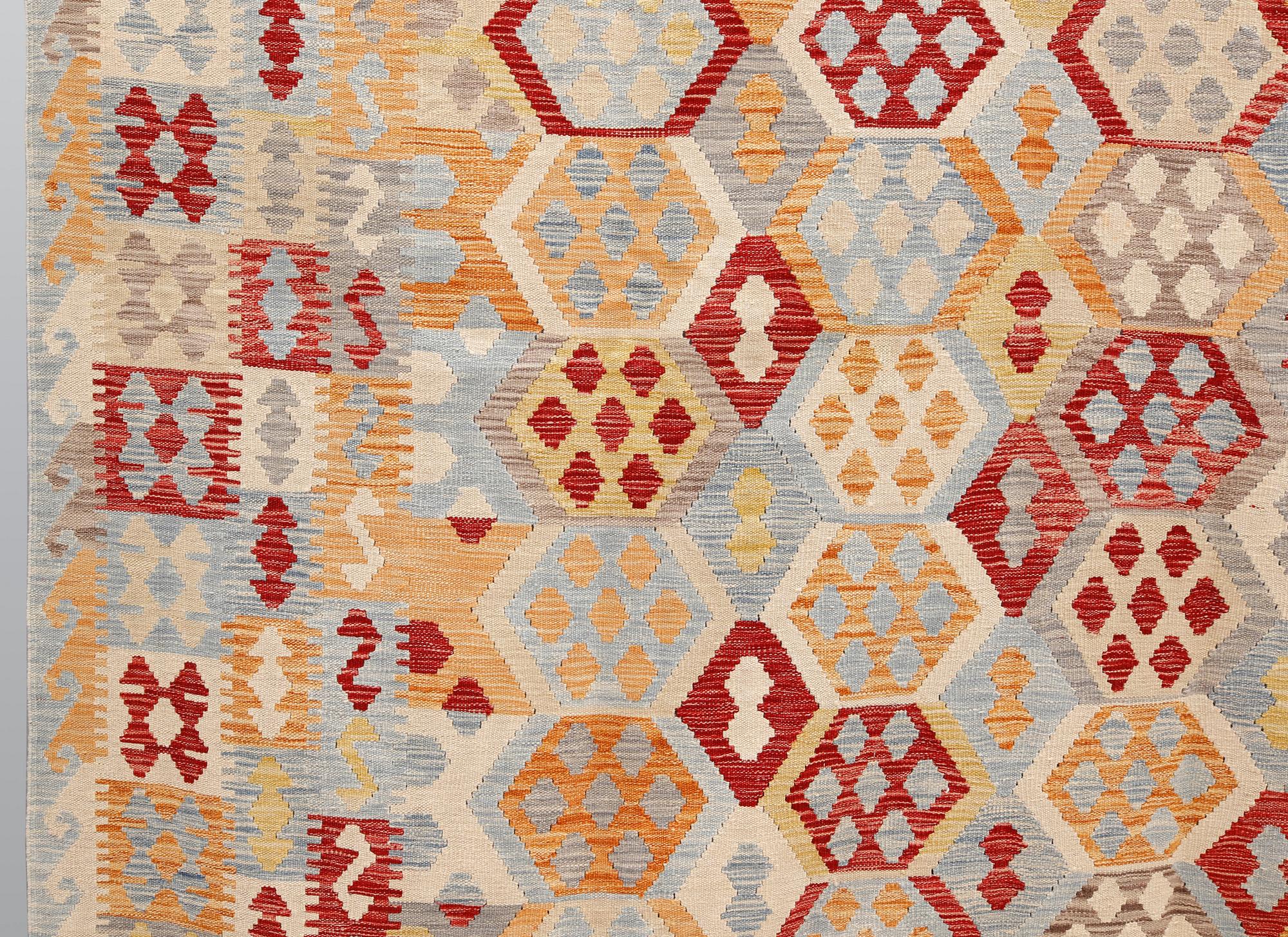 A kilim carpet, ca 340 x 259 cm.
