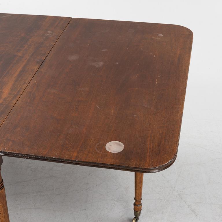 A mahogany dining table, second half of the 19th Century.