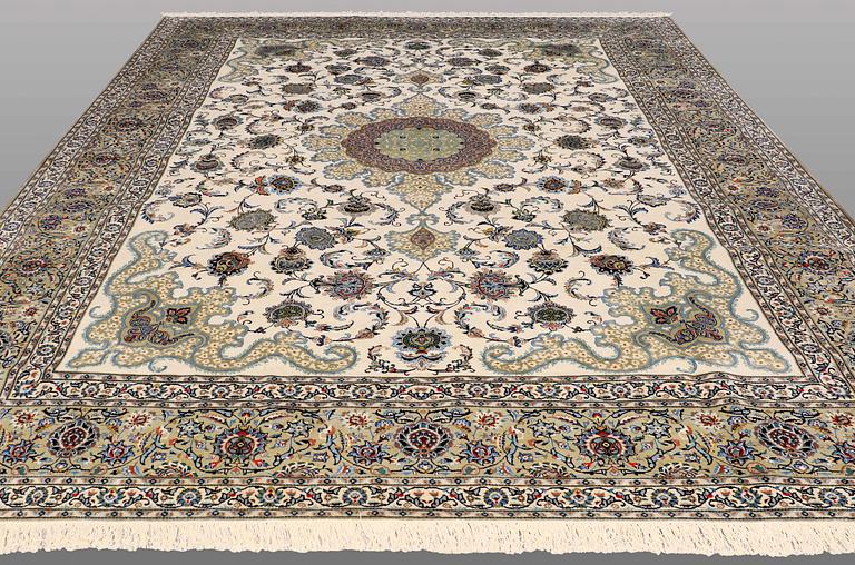 A signed so called Royal Kashan carpet, ca 432 x 313 cm.