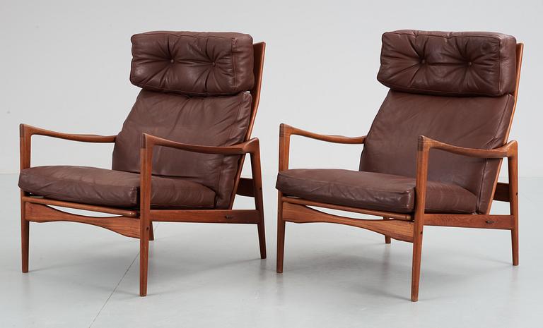 A pair of Ib Kofod Larsen teak and brown leather easy chairs, OPE Möbler, Sweden 1960's.