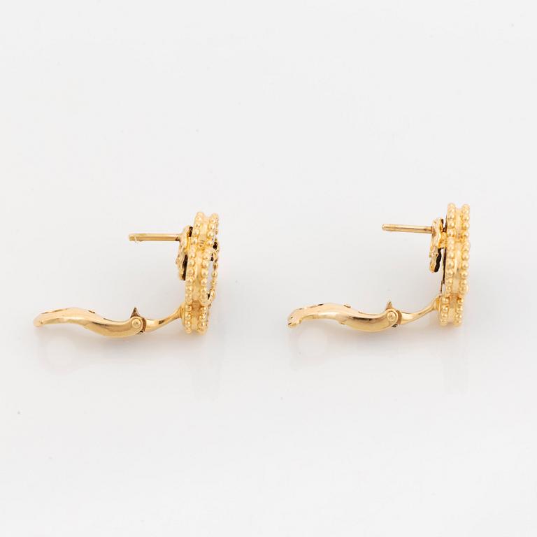 A pair of Van Cleef & Arpels "Alhambra" earrings in 18K gold and onyx.