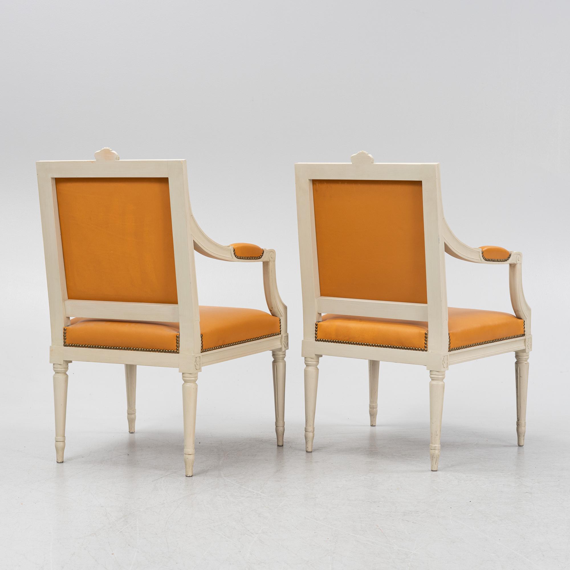 A pair of Gustavian style armchairs, end of the 20th Century.