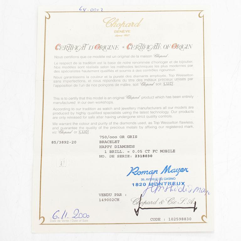Chopard, armband, "Happy Diamonds", 18K vitguld, gummi och en diamant 0.05 ct.