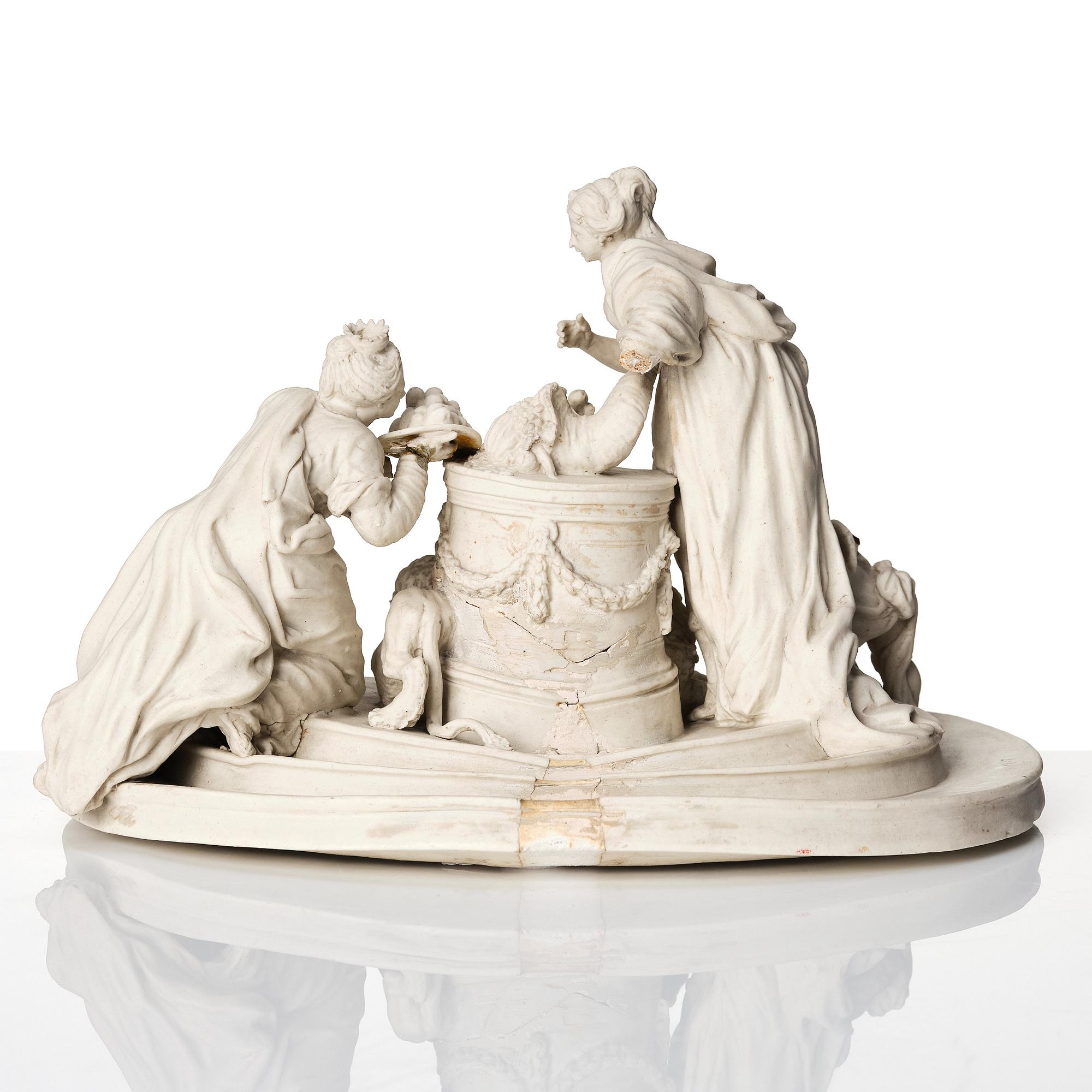 An Italian bisquit porcelain figure group with the arms of Savojen, Vinovo, marked 1817.