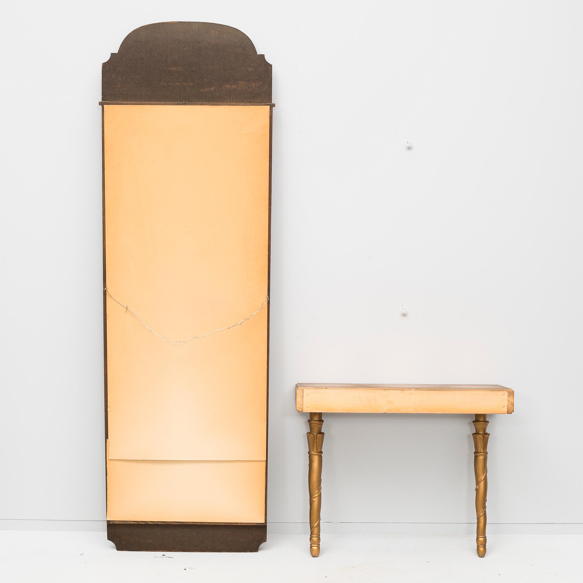 A mirror with table, first half of the 20th century.