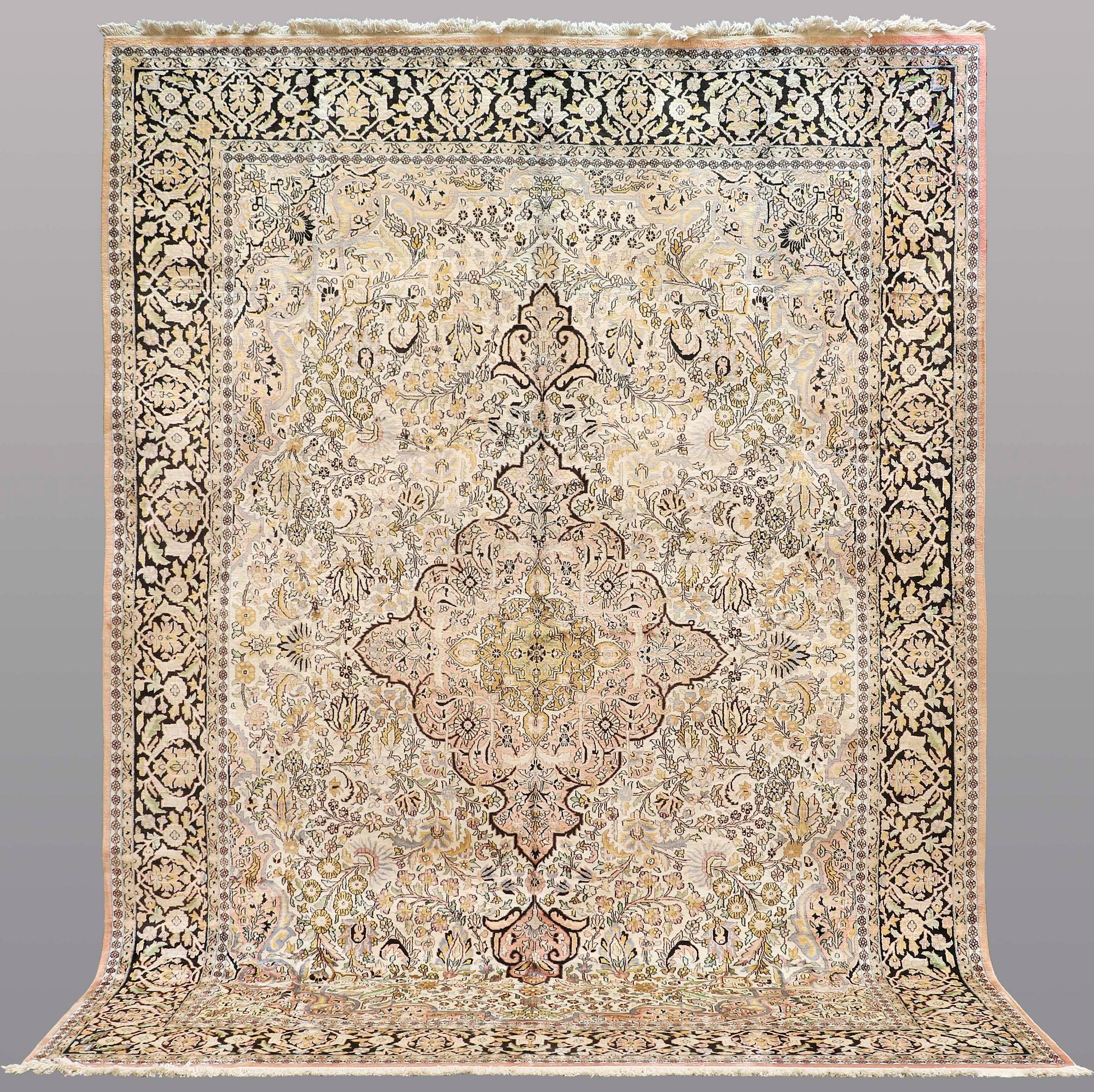 A CARPET, old silk Kashmir, ca 380 x 274 cm.